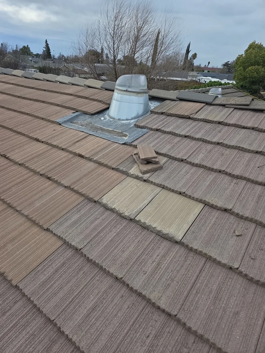 Hilmar tile roof after repair — restored, properly seated roof tiles